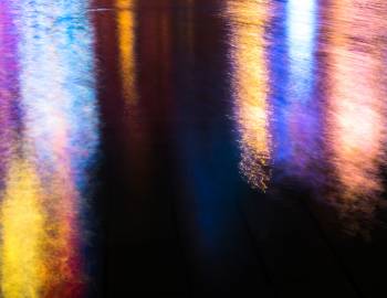 lights reflecting on dark water