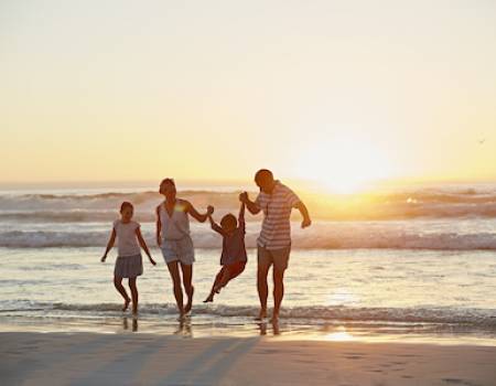 family walking on beach