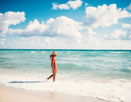 woman walking on beach