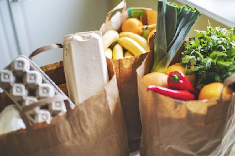 3 bags of groceries in brown paper bags