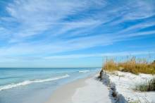sand dunes and water view in Florida