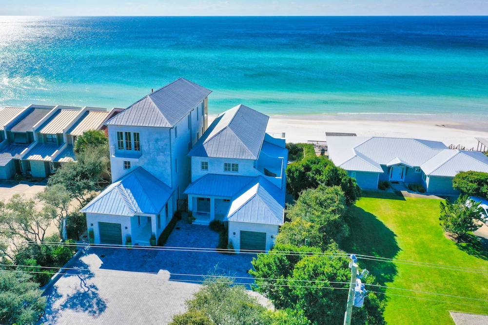 Aerial view of two oceanfront vacation properties in 30A