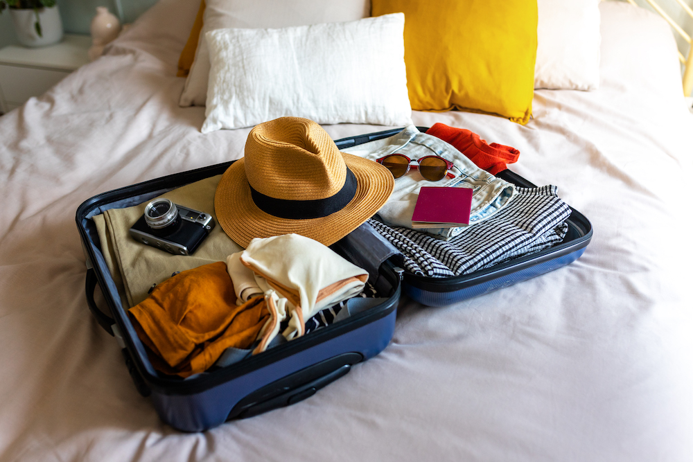 suitcase packed for a trip to the beach